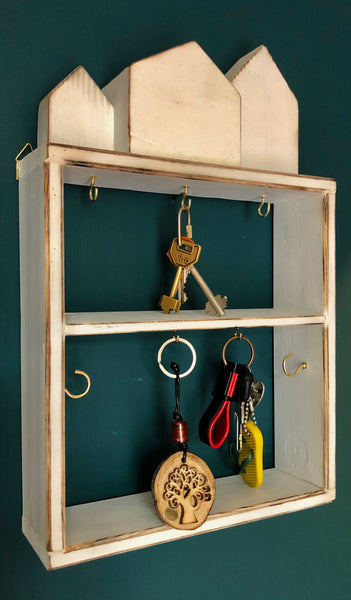 QUARTIERI Cornice portachiavi da muro bianca con casette stilizzate