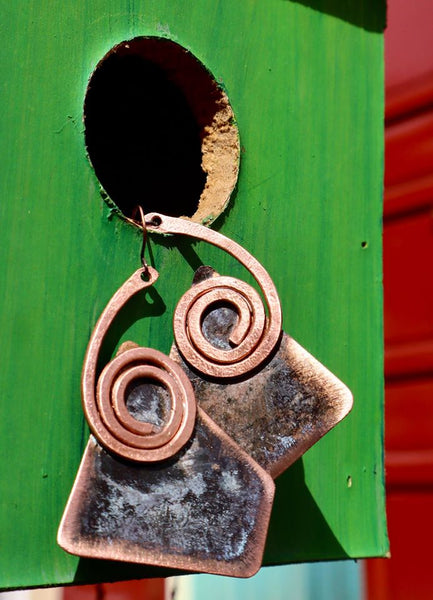 QUARTIERI Orecchini Tribal speculari in Rame