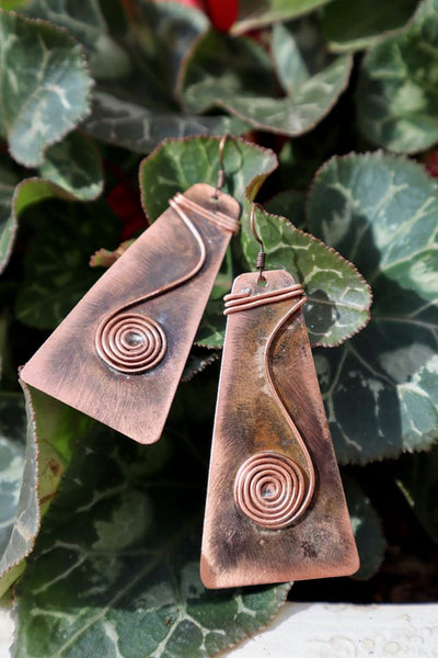 QUARTIERI Orecchini Tribal speculari in Rame